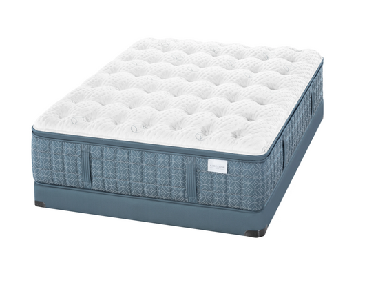 Luxurious Mattress with a blue exterior and white interior on a white background