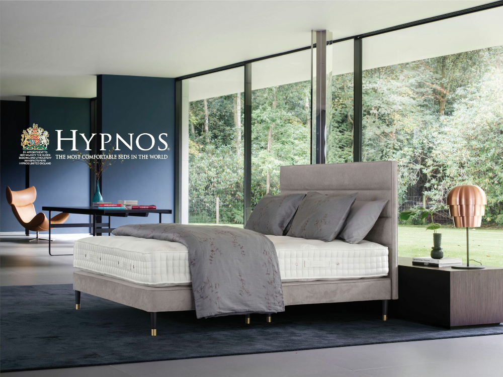 Hypnos Empress mattress in a cozy, modern bedroom placed on a grey bed.