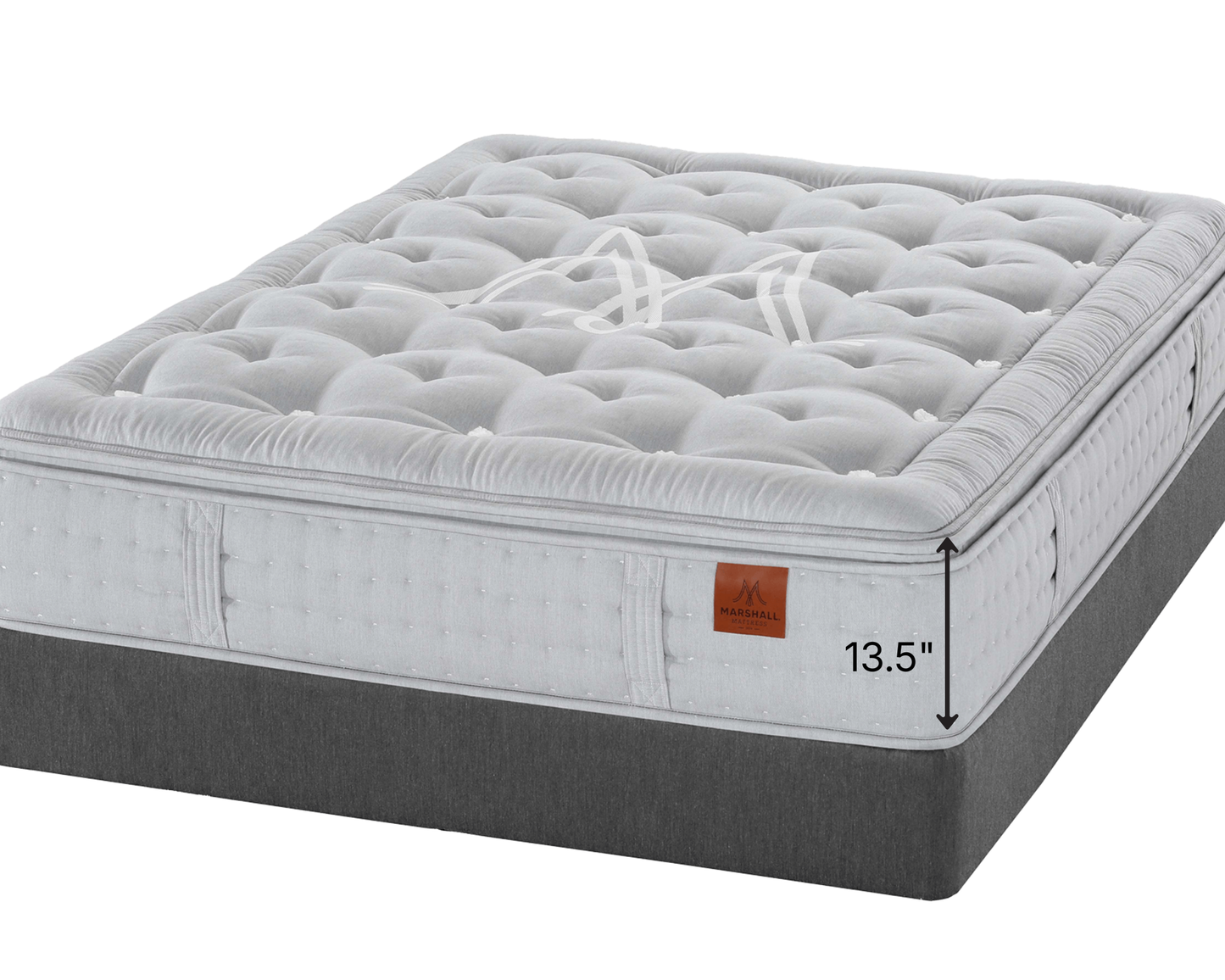 Marshall Georgian mattress shown at an angle on a white background, with a dark gray upholstered base and a small side label. A dimension marker reads 13.5".