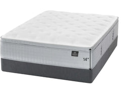 A Marshall Louise mattress shown at an angle on a plain white background, with a tufted white top, gray side panel, and dark gray base. A small side label reads 14 inches, and a small logo badge is visible on the front.