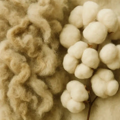 Close-up of natural wool fibers and soft organic cotton bolls used in Sprout mattresses, highlighting eco-friendly, breathable, non-toxic materials for healthier sleep.