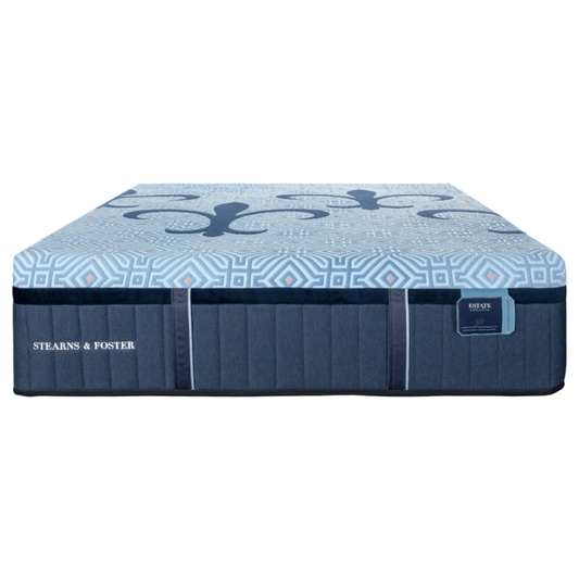 Blue and white patterned Luxury Firm Hybrid mattress with Stearns & Foster branding on a white background