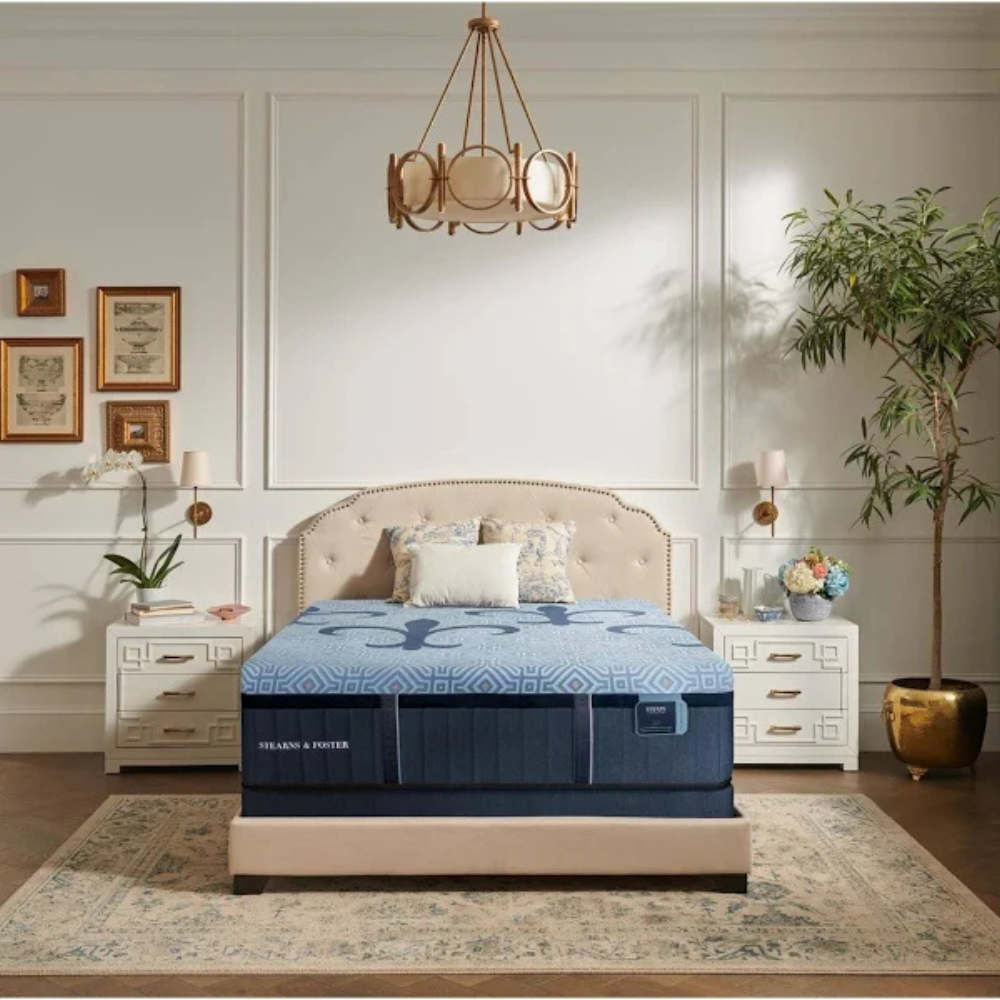 Stearns and Foster Dia Hybrid Plush Mattress on a bedframe with decorative furniture