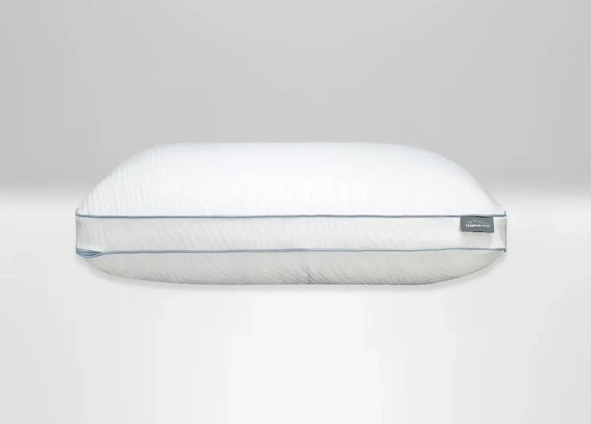 A white Tempur ProBlend pillow with a quilted, ribbed texture and a thin light blue piping detail along the edge, shown against a neutral light gray background.